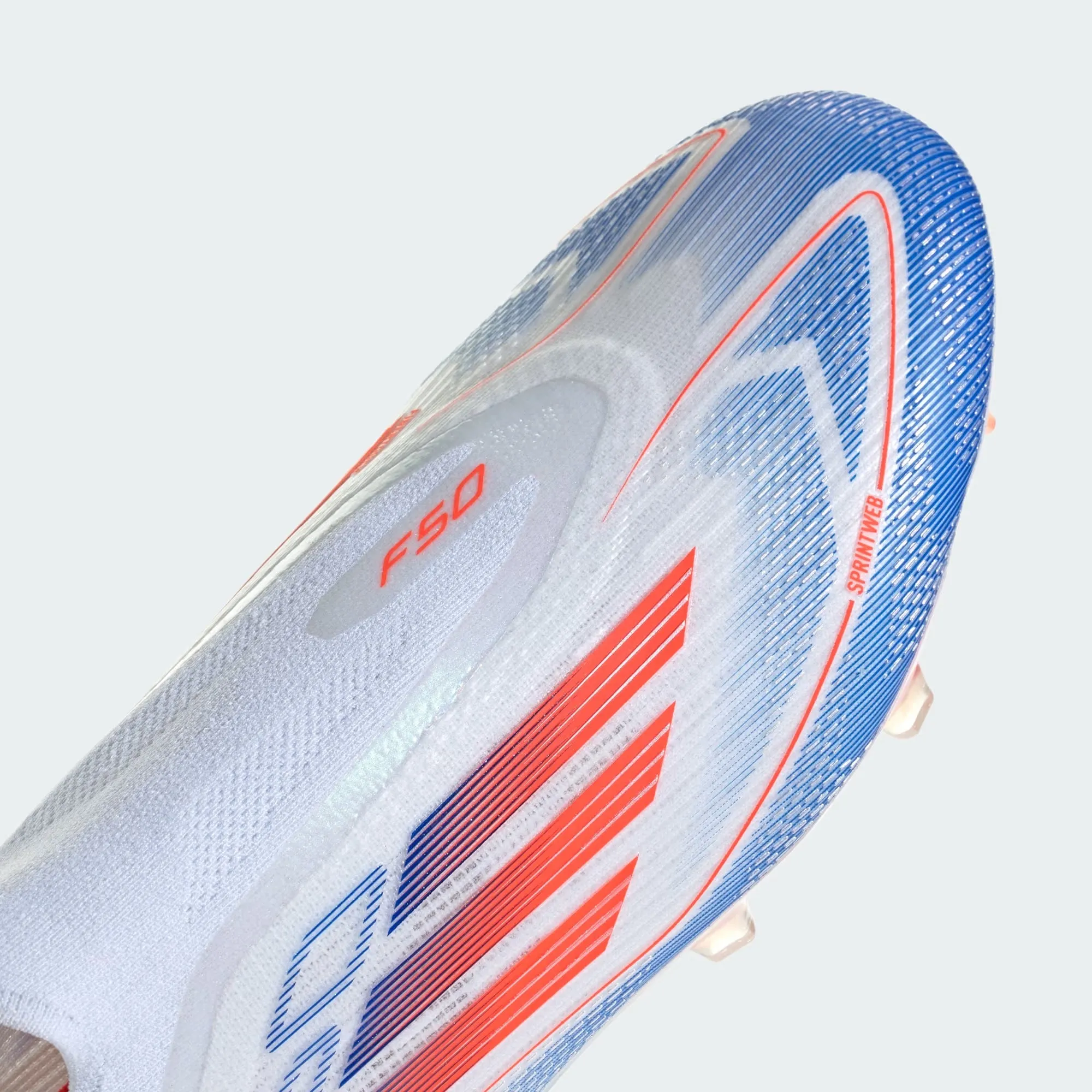 F50 ELITE LACELESS FG CLEATS [Cloud White / Solar Red / Lucid Blue]