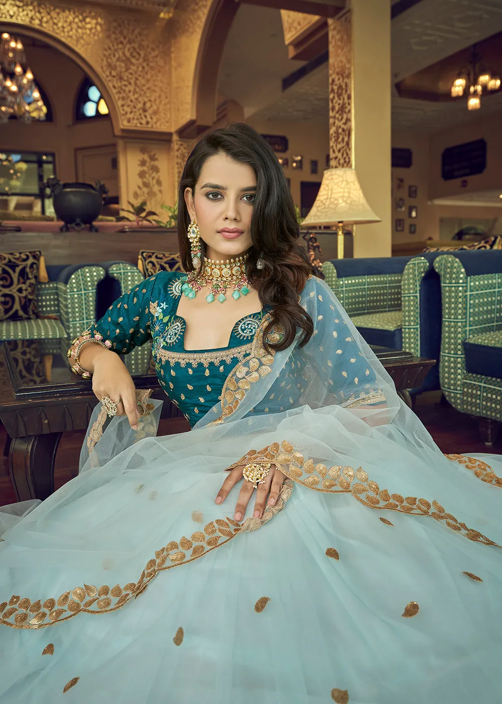 Impressive Sky Blue Heavy Net Party Wear Lehenga Choli